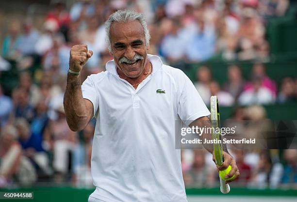 Mansour Bahrami celebrates winning a point during his Men's Doubles exhibition match against Pat Cash and Mikael Pernfors at the BNP Paribas Tennis...