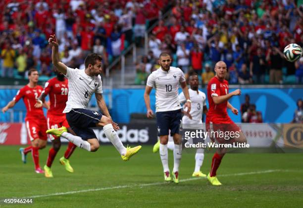 Yohan Cabaye of France hits a rebound from a penalty save during the 2014 FIFA World Cup Brazil Group E match between Switzerland and France at Arena...