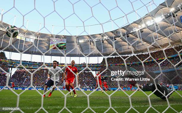 Mathieu Valbuena of France scores his team's third goal past Diego Benaglio of Switzerland during the 2014 FIFA World Cup Brazil Group E match...