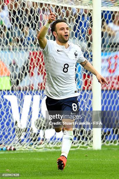 Mathieu Valbuena of France celebrates scoring his team's third goal during the 2014 FIFA World Cup Brazil Group E match between Switzerland and...