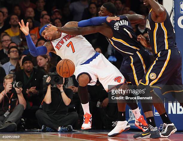 Lance Stephenson of the Indiana Pacers fouls Carmelo Anthony of the New York Knicks in the third quarter at Madison Square Garden on November 20,...