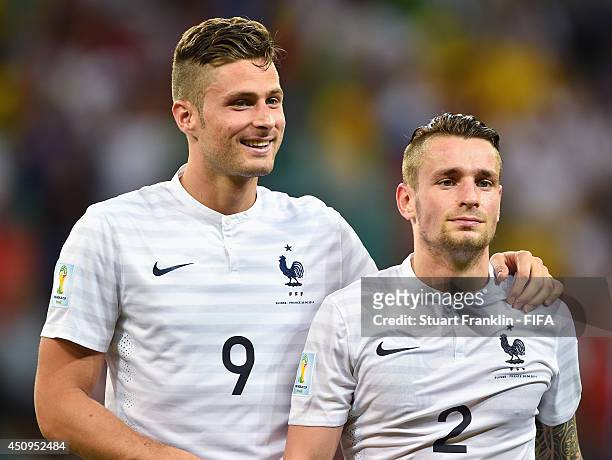 Olivier Giroud and Mathieu Debuchy of France celebrate the 5-2 win after the 2014 FIFA World Cup Brazil Group E match between Switzerland and France...
