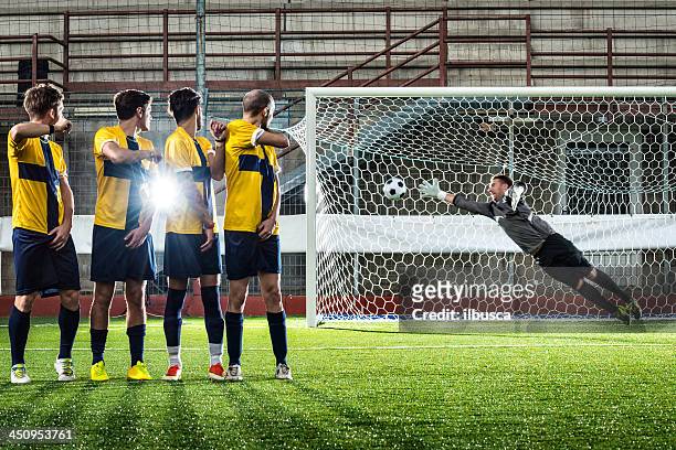 football match in stadium: free kick goal - penalty kick stock pictures, royalty-free photos & images