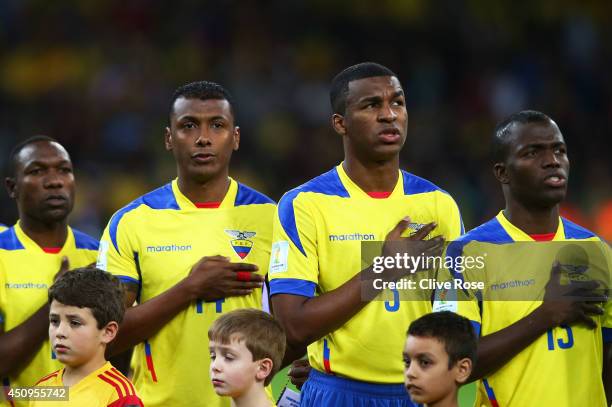 Walter Ayovi, Oswaldo Minda, Frickson Erazo and Enner Valencia of Ecuador sing the National Anthem prior to the 2014 FIFA World Cup Brazil Group E...