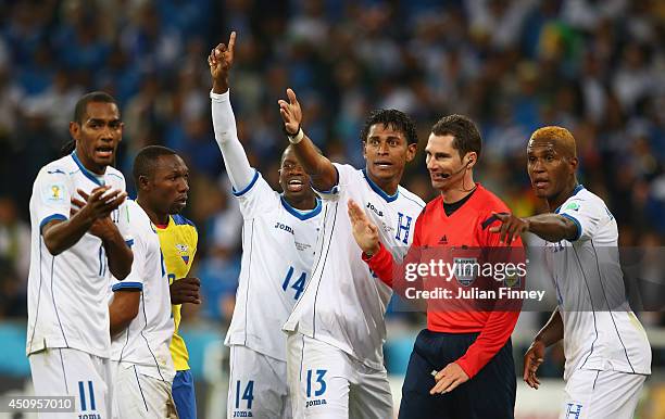 Honduras appeal to referee Benjamin Williams after a call during the 2014 FIFA World Cup Brazil Group E match between Honduras and Ecuador at Arena...