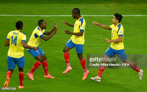 Enner Valencia of Ecuador celebrates scoring his team's first goal with his teammate Walter Ayovi , Oswaldo Minda and Christian Noboa of Ecuador...