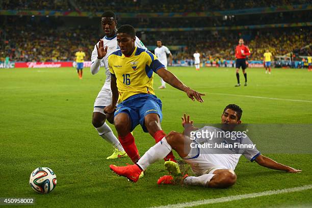 Jorge Claros of Honduras tackles Antonio Valencia of Ecuador during the 2014 FIFA World Cup Brazil Group E match between Honduras and Ecuador at...