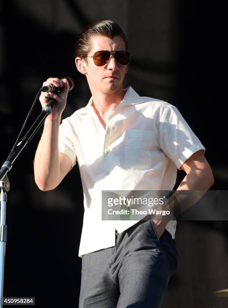Alex Turner of Arctic Monkeys performs onstage during day 2 of the Firefly Music Festival on June 20, 2014 in Dover, Delaware.