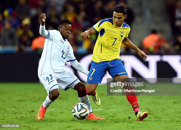 Marvin Chavez of Honduras and Jefferson Montero of Ecuador compete for the ball during the 2014 FIFA World Cup Brazil Group E match between Honduras...
