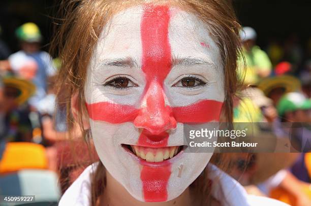 Barmy Army member with facepaint poses during day one of the First Ashes Test match between Australia and England at The Gabba on November 21, 2013...