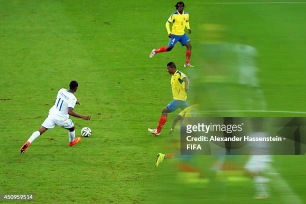 Jerry Bengtson of Honduras battles for the ball with Jorge Guagua of Ecuador during the 2014 FIFA World Cup Brazil Group E match between Honduras and...