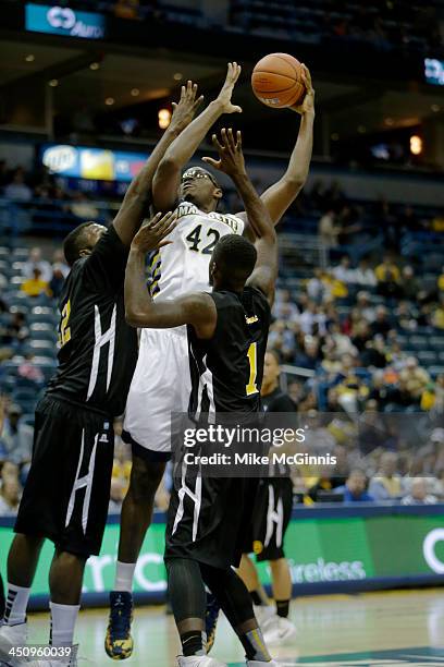 Chris Otule of the Marquette Golden Eagles drives to the hoop during the game against the Grambling State Tigers at BMO Harris Bradley Center on...