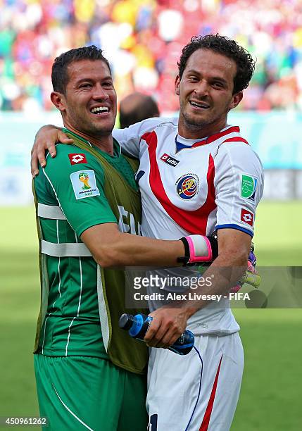 Marcos Urena of Costa Rica celebrates with Daniel Cambronero after the 2014 FIFA World Cup Brazil Group D match between Italy and Costa Rica at Arena...