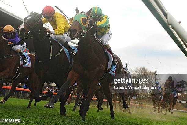 Michelle Payne riding Street Allure defeats Kayla Nisbet riding Longchamp Belle in Race 4, the Euroze Handicap during Melbourne racing at Moonee...