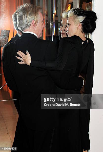 Philip Treacy and Daphne Guinness attend the Isabella Blow: Fashion Galore! charity dinner hosted by the Isabella Blow Foundation at Claridges Hotel...