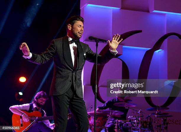 Miguel Poveda performs on stage during the Onda Awards 2013 Gala at the Gran Teatre del Liceu on November 20, 2013 in Barcelona, Spain.