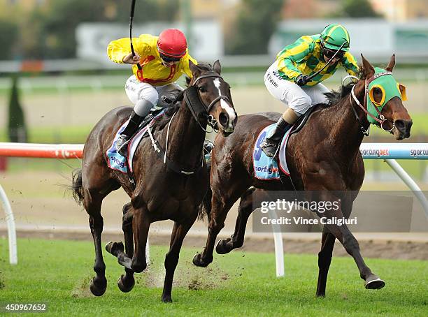 Michelle Payne riding Street Allure defeats Kayla Nisbet riding Longchamp Belle in Race 4, the Euroze Handicap during Melbourne racing at Moonee...