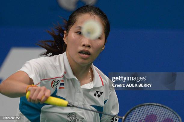 May Ratchanok Ratchanok Intanon of Thailand plays a return against Wang Shixian of ...