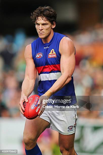 Will Minson of the Bulldogs prepares to kick the ball during the round 14 AFL match between the Port Adelaide Power and the Western Bulldogs at...