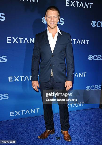 Actor Charlie Bewley attends the premiere of "Extant" at California Science Center on June 16, 2014 in Los Angeles, California.
