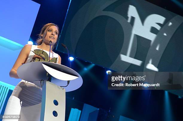Michelle Jenner accepts the 'Best National Actress' award at the Onda Awards 2013 Gala at the Gran Teatre del Liceu on November 20, 2013 in...