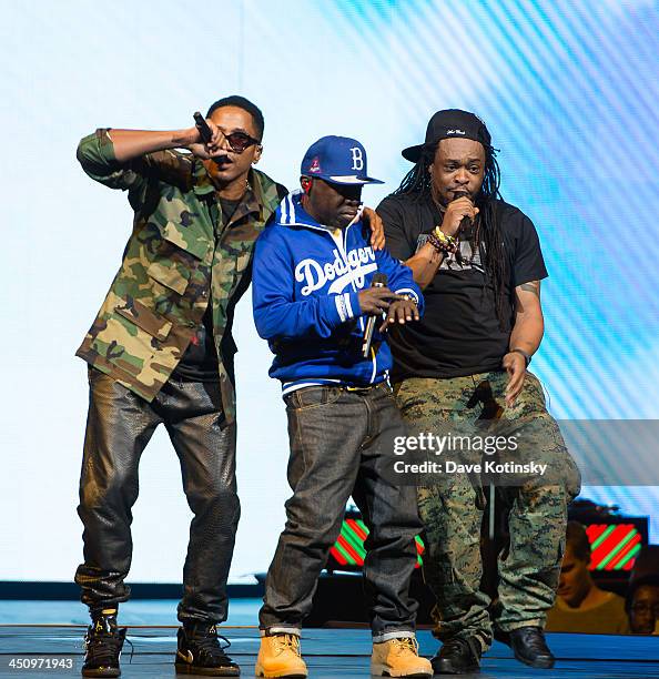 Tip, Phife Dawg and Jarobi White of A Tribe Called Quest perform at Barclays Center on November 20, 2013 in New York City.