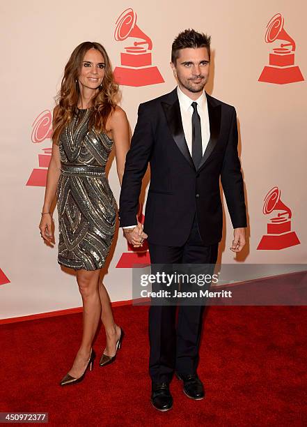 Recording Artist Juanes and actress Karen Martinez arrive at the 2013 Latin Recording Academy Person Of The Year honoring Miguel Bose at the Mandalay...