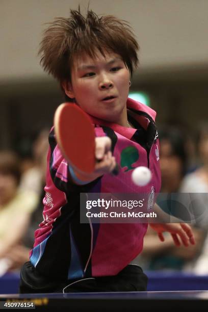 Chen Szu-Yu of Taipei returns a shot against Yu Mengyu of Singapore during their Women's Singles Quarter final match on day two of 2014 ITTF World...