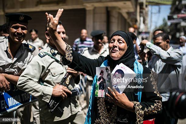 Relatives of prisoners gather to support prisoners before court confirmed death sentences for 183 Islamists on June 21, 2014 in Minya, Cairo, Egypt....