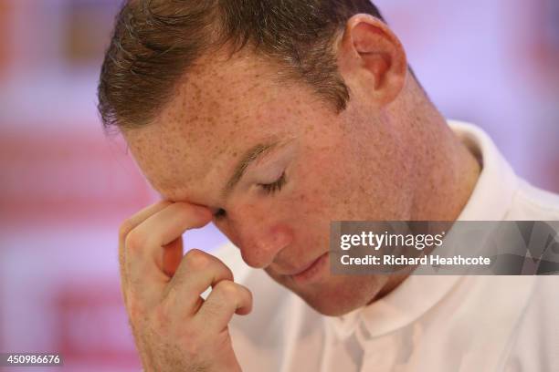 Wayne Rooney faces the media in a press conference after an England training session at the Urca Military Base on June 21, 2014 in Rio de Janeiro,...