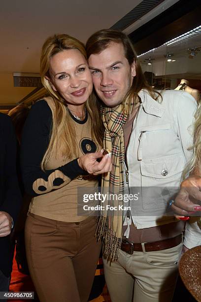 Marlene Mourreau and Christophe Guillarme attend 'La Mode By Regina' At the Champs Elysee Regina Shop on November 20, 2013 in Paris, France.