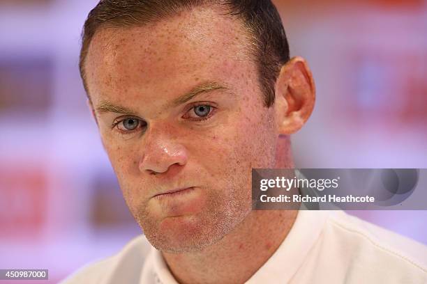 Wayne Rooney faces the media in a press conference after an England training session at the Urca Military Base on June 21, 2014 in Rio de Janeiro,...