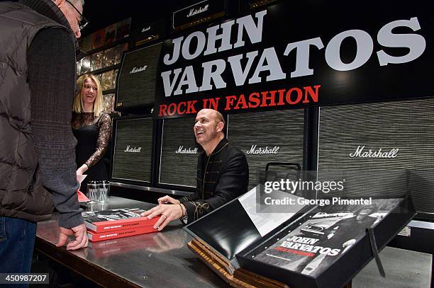 Fashion Designer John Varvatos and guests attend the opening of his new Toronto store and the launch of JOHN VARVATOS: ROCK IN FASHION Book at John...