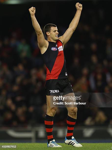 Brent Stanton of the Bombers celebrates winning the game after the round 14 AFL match between the Essendon Bombers and the Adelaide Crows at Etihad...