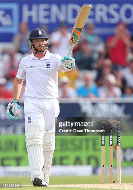 Ian Bell of England celebrates making 50 not out in his 100th test match during day two of the 2nd Investec Test match between England and Sri Lanka...
