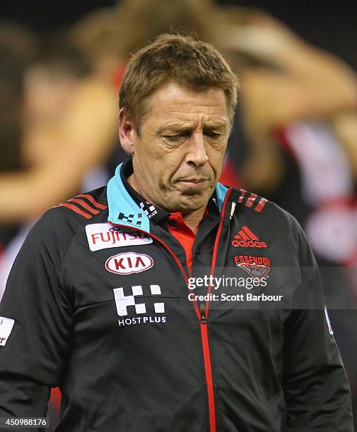 Bombers Head coach Mark Thompson looks on during the round 14 AFL match between the Essendon Bombers and the Adelaide Crows at Etihad Stadium on June...