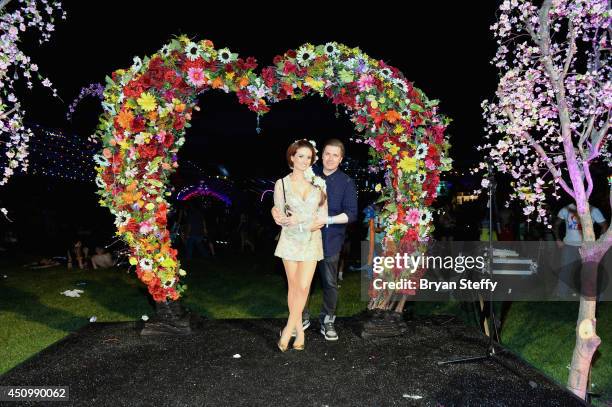 Television personality Holly Madison and Pasquale Rotella attend the 18th annual Electric Daisy Carnival at Las Vegas Motor Speedway on June 21, 2014...