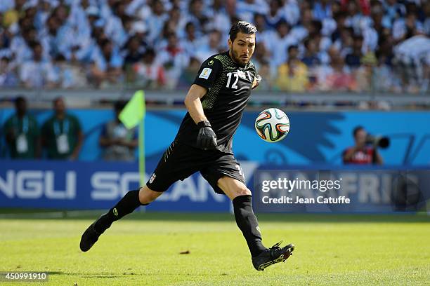 Goalkeeper of Iran Alireza Haghighi in action during the 2014 FIFA World Cup Brazil Group F match between Argentina and Iran at Estadio Mineirao on...