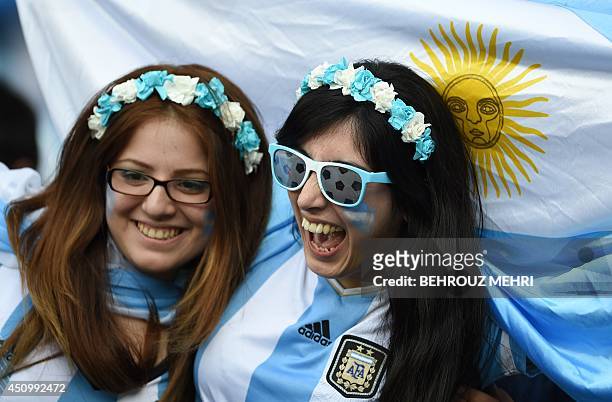 Argentina fans celebrate during the Group F football match between Argentina and Iran at the Mineirao Stadium in Belo Horizonte during the 2014 FIFA...