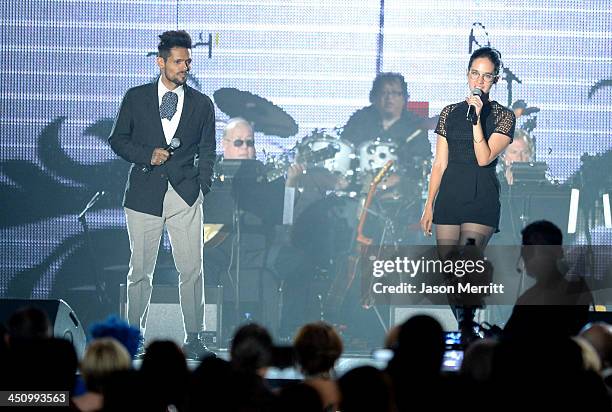 Singers Draco Rosa and Ximena Sarinana perform onstage during the 2013 Latin Recording Academy Person Of The Year honoring Miguel Bose at the...
