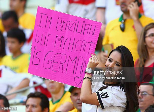 Germany fan poses prior to the 2014 FIFA World Cup Brazil Group G match between Germany and Ghana at Castelao on June 21, 2014 in Fortaleza, Brazil.