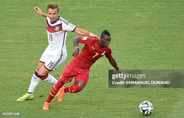 Germany's forward Mario Goetze vies with Ghana's midfielder Mohammed Rabiu during a Group G football match between Germany and Ghana at the Castelao...