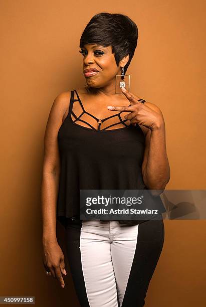 Actress Niecy Nash poses for a portrait at the 2014 American Black Film Festival at the Metropolitan Pavillion on June 21, 2014 in New York City.