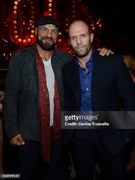 Jason Statham and Randy Couture attend the Homefront premiere at Planet Hollywood Resort & Casino on November 20, 2013 in Las Vegas, Nevada.