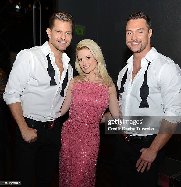 Jaymes & James pose for photos with Holly Madison at he Homefront premiere at Planet Hollywood Resort & Casino on November 20, 2013 in Las Vegas,...