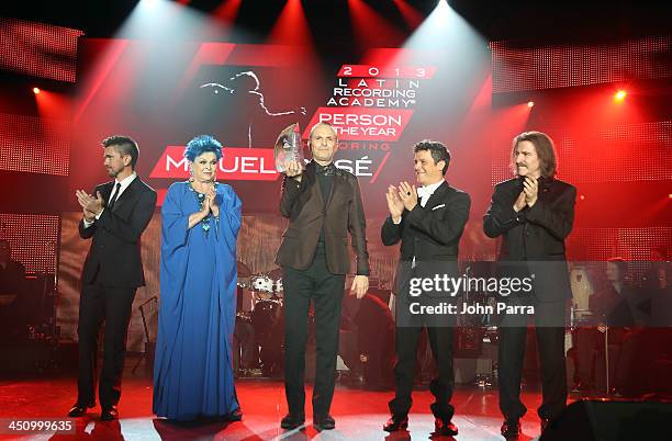 Recording artist Juanes, actress Lucia Bose, honoree Miguel Bose, recording artist Alejandro Sanz and Chairman of the Latin Recording Academy Luis...