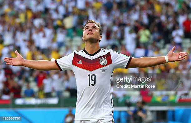 Mario Goetze of Germany celebrates scoring his team's first goal during the 2014 FIFA World Cup Brazil Group G match between Germany and Ghana at...