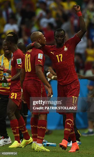 Ghana's midfielder Andre Ayew celebrates with Ghana's midfielder Mohammed Rabiu after scoring during a Group G football match between Germany and...