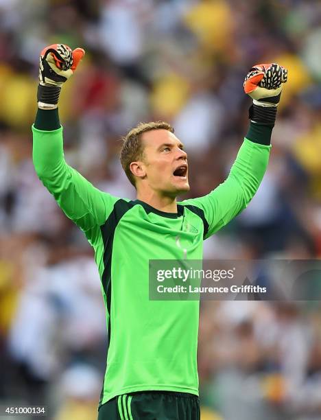 Manuel Neuer of Germany celebrates his team's first goal during the 2014 FIFA World Cup Brazil Group G match between Germany and Ghana at Castelao on...