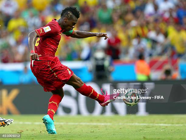 Asamoah Gyan of Ghana scores his team's second goal during the 2014 FIFA World Cup Brazil Group G match between Germany and Ghana at Castelao on June...